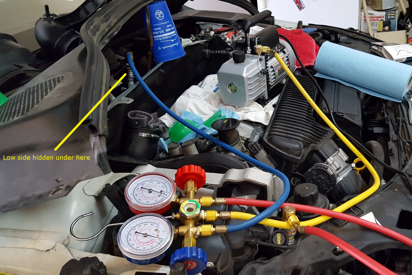 ’12 Volvo S60 AC Compressor Change Turning a wrench